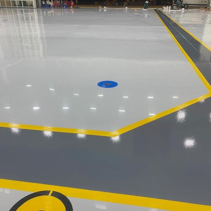 Premium metallic epoxy floor spanning a commercial interior
