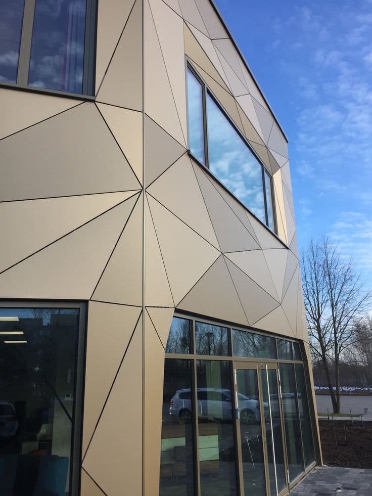 Champagne ACP facade with tessellated triangular panels