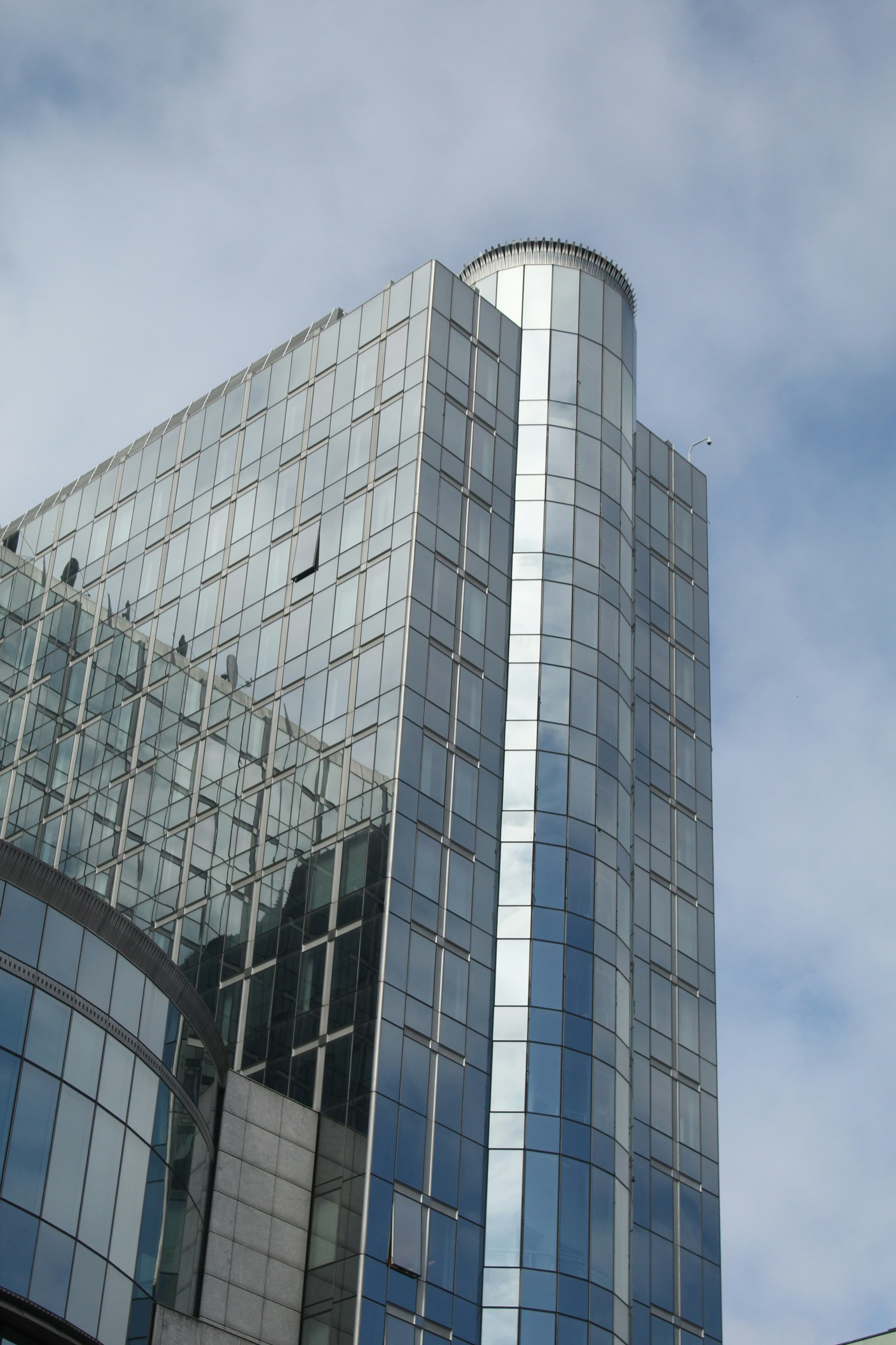 Glass curtain wall facade spanning a modern commercial elevation