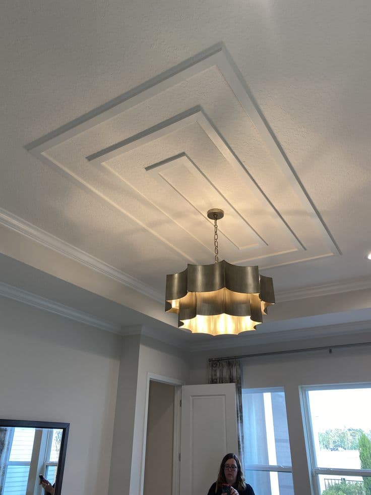 Layered POP cove ceiling detailing